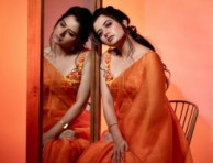 Thayige Thakka Maga Actress Ashika Ranganath Shines In A Orange Saree - View Pics