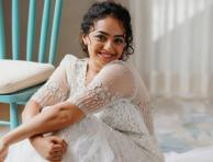 Ninnila Ninnila Actress Nithya Menen's Latest Pictures In White Heavy Gown Which Looks Amazing
