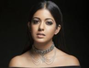Blank Movie Actress Ishita Dutta's Bold Stills In A Strapless Mini Outfit - View Pics