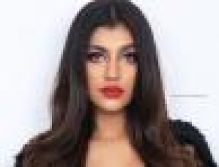 Zombie Movie Actress Yashika Aannand With Bright Lipstick Looks Stunning - View Pics