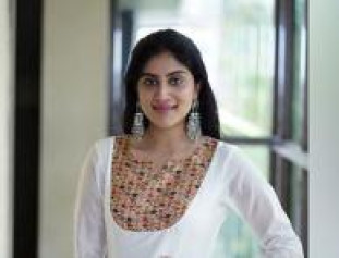 Dhanya Balakrishna poses with beautiful smile in this photoshoot