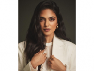 Take A Peek Into The White Monochrome Avatar Of Actress Malavika Mohanan!!
