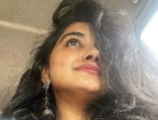 Actress Nivetha Thomas Photo-Bombs Are Too Cute To Handle. Don't Forget To Check Out Her Cute Bindis !!
