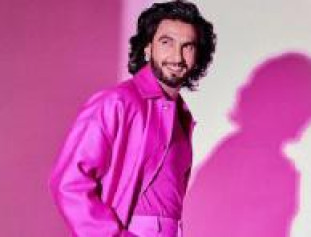 Bollywood Handsome, Funky And Versatile Actor Ranveer Singh Looks Stylish As Always In This Purple Coat. 