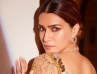 Indian Actress Kriti Sanon Stunning In Classic Gold Signature Tulle Gold Crystal Corset Top Styling..